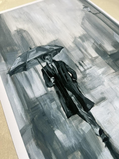 Just a gent, walking in the rain.