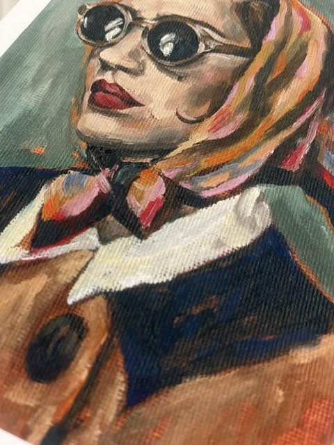 Just a lady, and her silk headscarf.